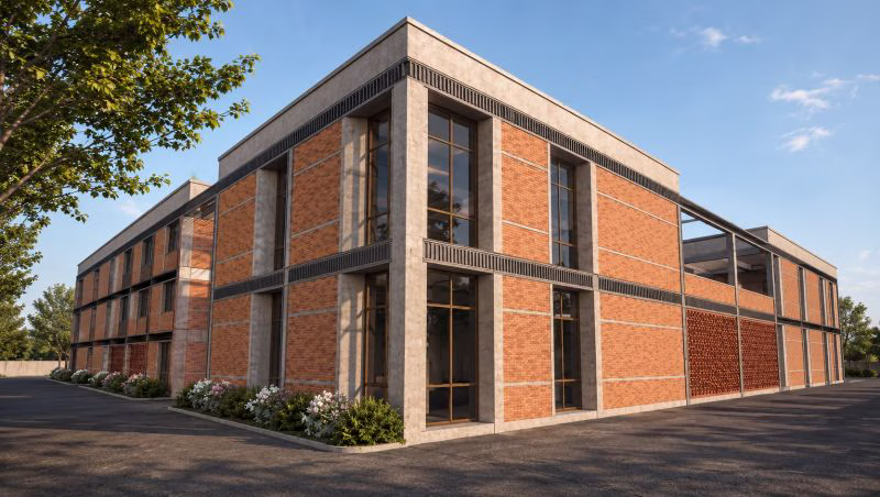 The purpose-built factory of a luxury furniture manufacturer in India, seen from outside.