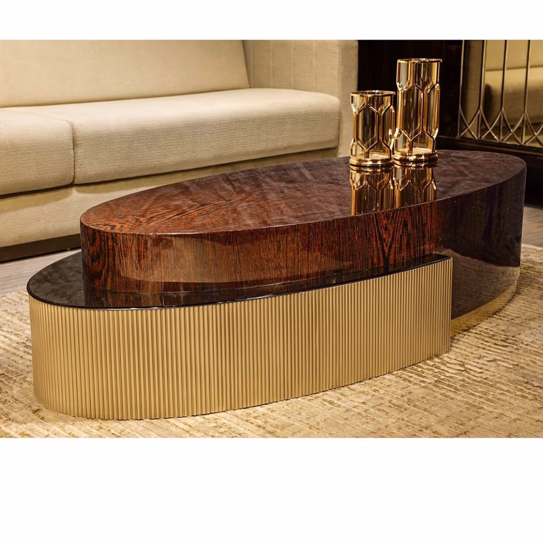 A burl-wood table surface that needs careful maintenance.