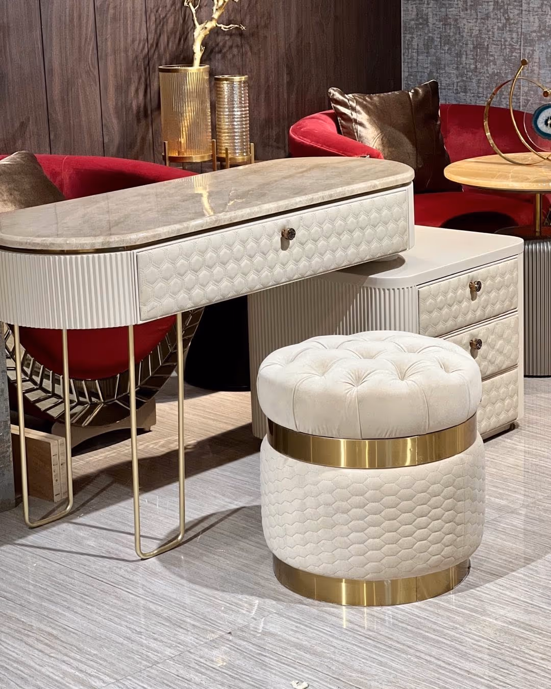 A fitted wardrobe and dressing area in a luxury bedroom.