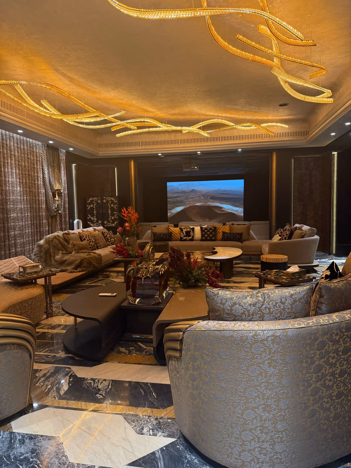 A finished Designatore interior — panelled walls, a moulded ceiling and made-to-order furniture.
