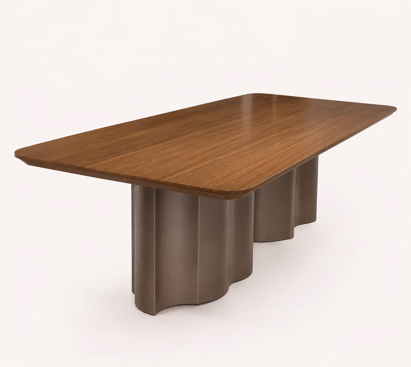 Designatore Walnut Wave dining table with a warm walnut solid wood top, softly rounded edges and a sculptural earth-taupe wave-form base, shown alone on a bone-white ground.