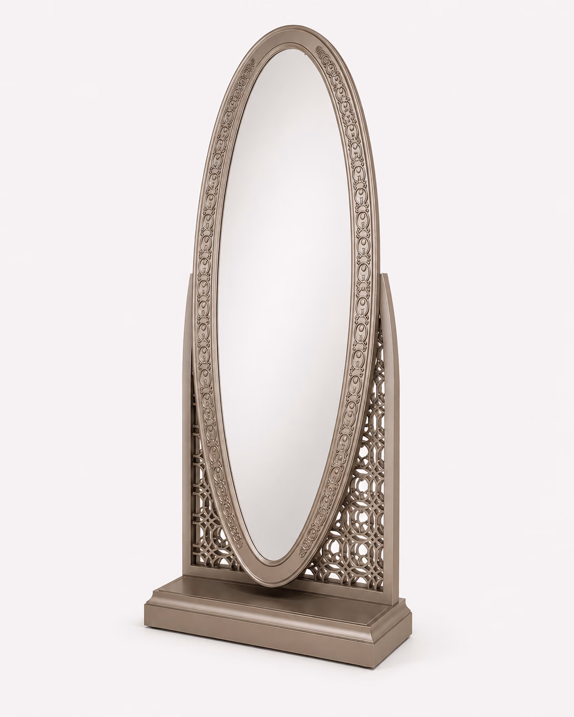 Designatore free-standing cheval dressing mirror shown alone on a bone ground, with a tall oval mirror in a hand-carved floral-motif frame, geometric lattice side panels and a stepped moulding base, all in a warm taupe metallic finish.