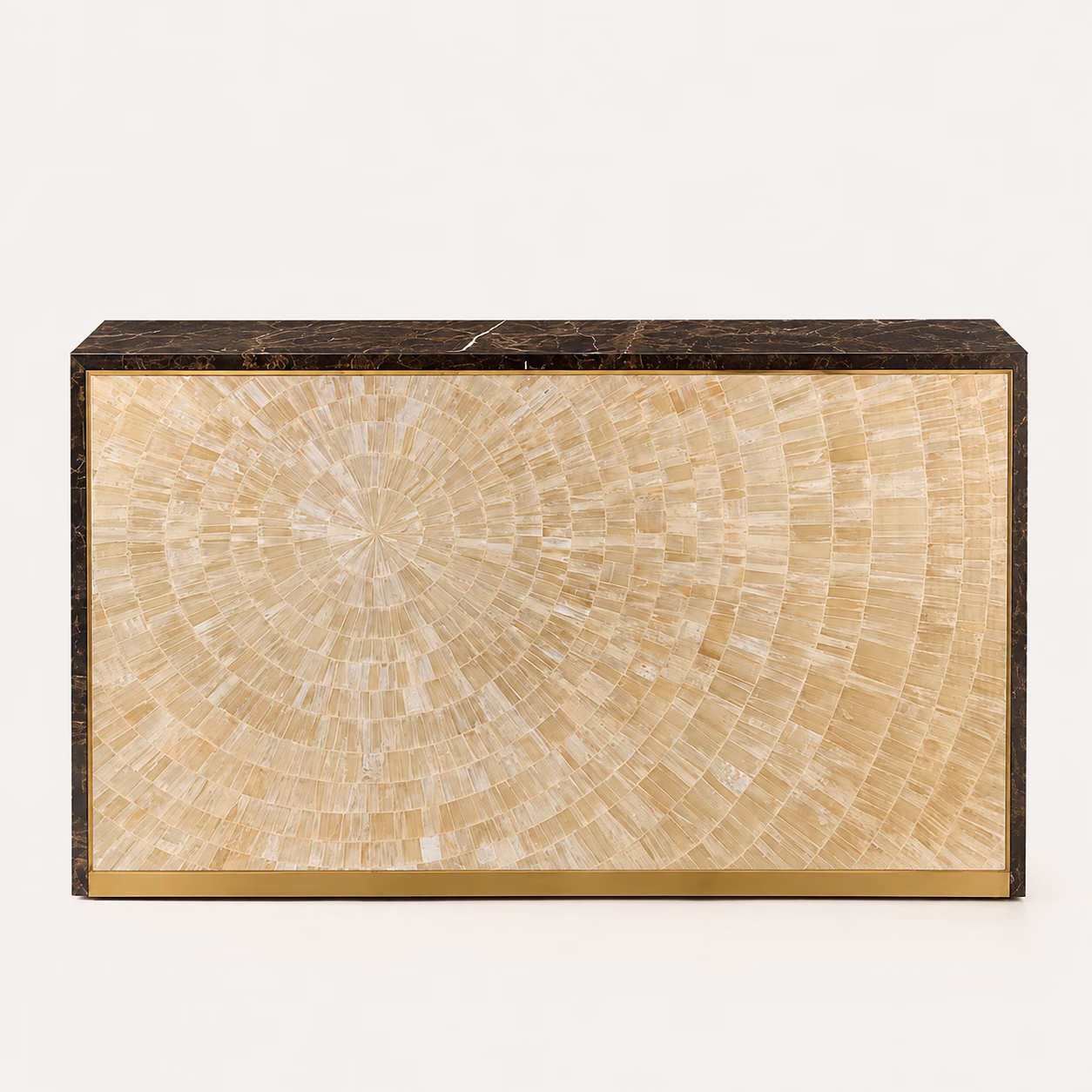 Designatore reception desk shown alone on a bone ground, its front face filled with a radial sunburst of hand-laid ivory selenite stone, framed in brushed gold and set into a rich brown Italian marble body with continuous veining and a gold plinth trim.